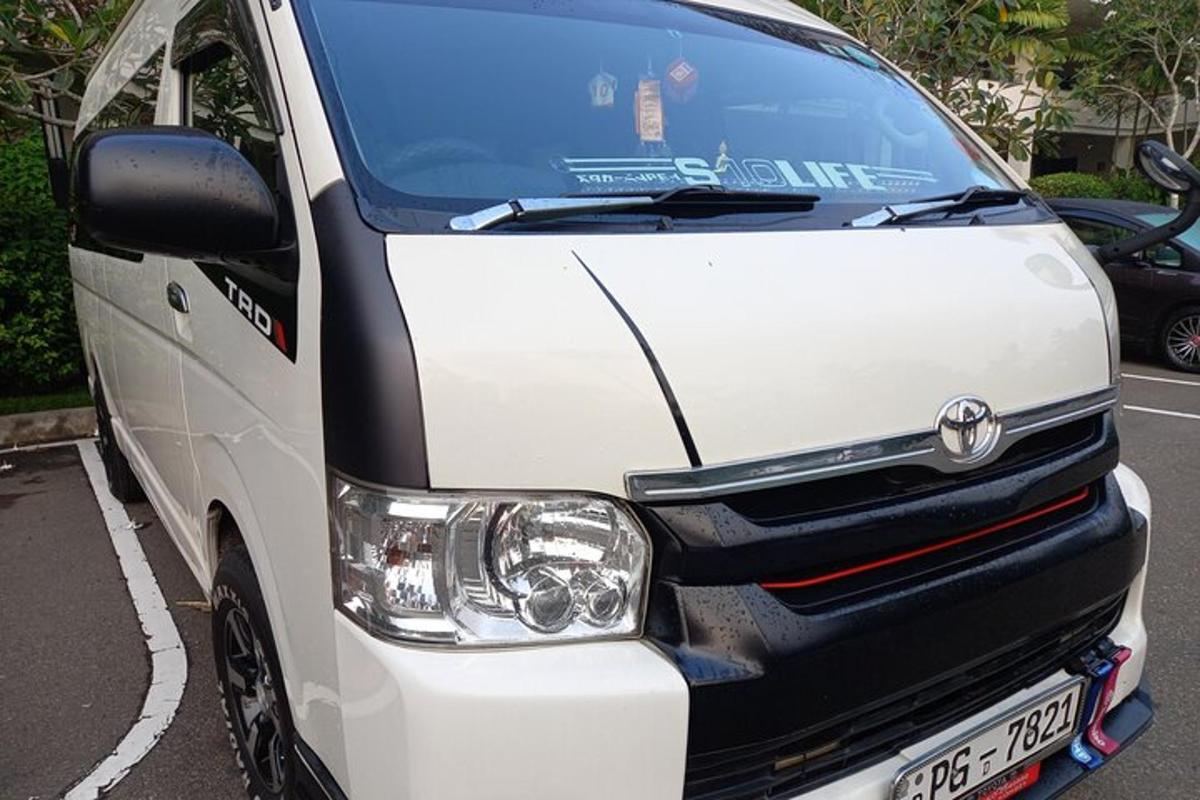 a white van parked in a parking lot