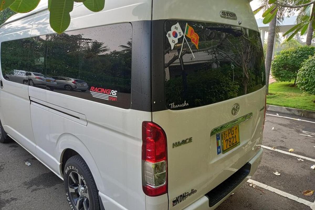 a white van parked in a parking lot