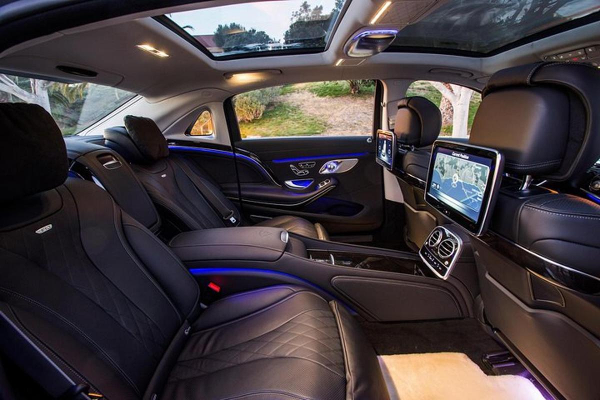a view of the inside of a car with a tv