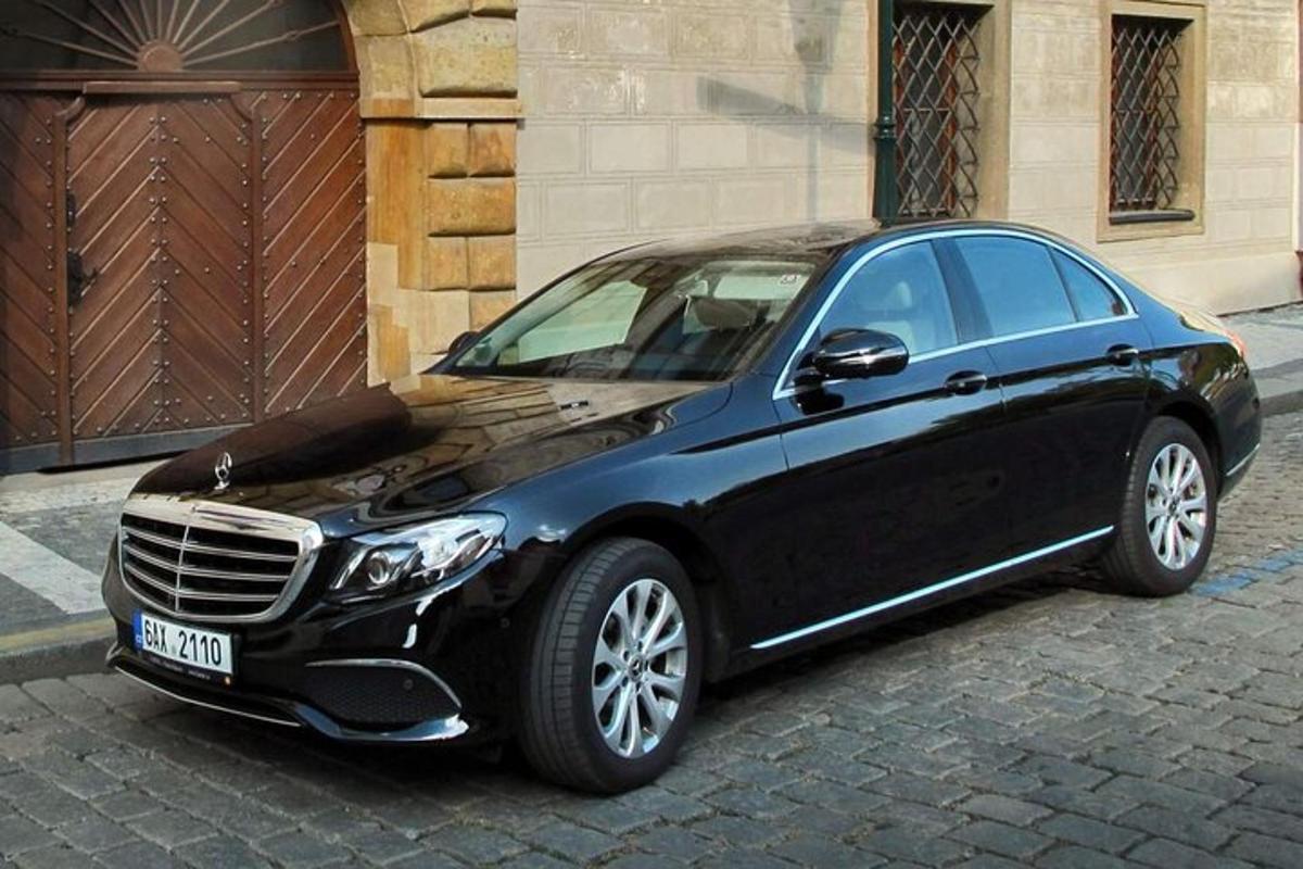 a black car parked in front of a building