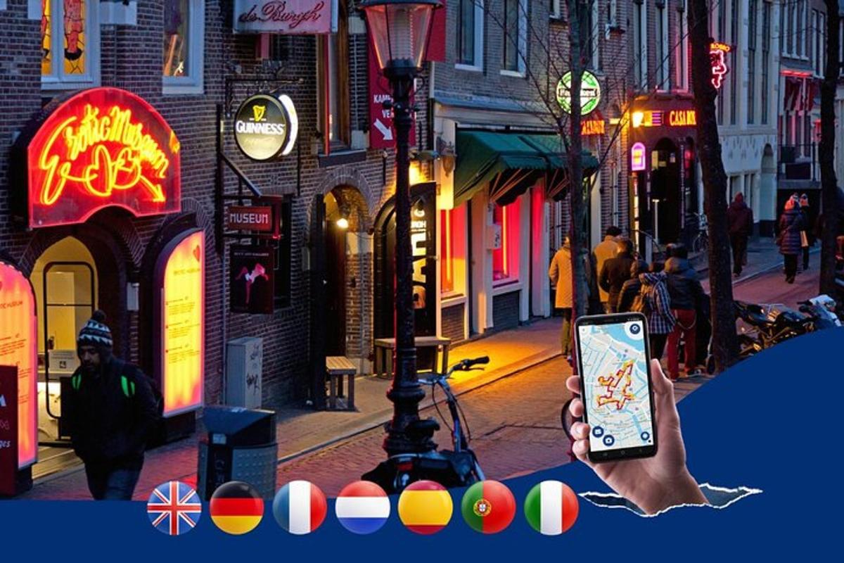 una mano che tiene un telefono cellulare davanti a una strada