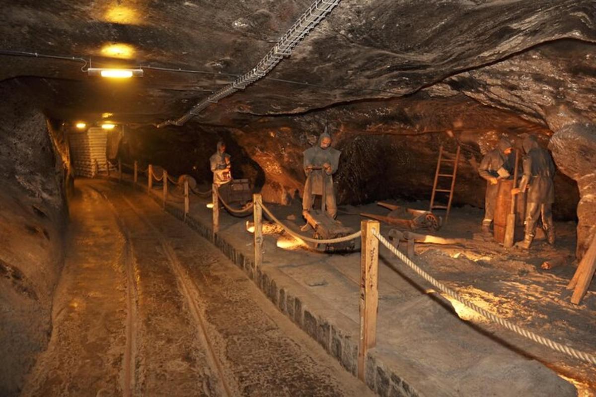 a group of people standing in a cave