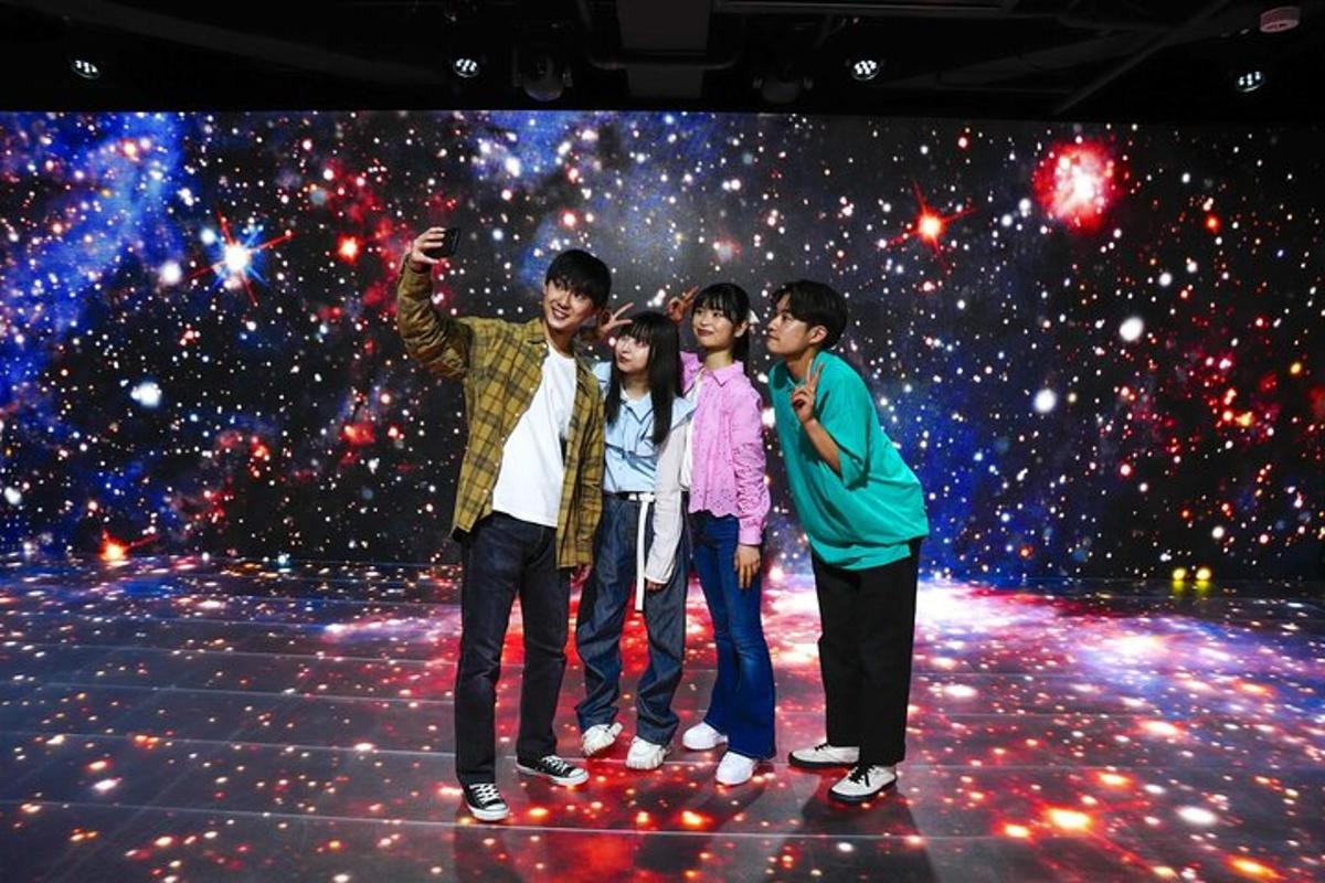 a group of people standing on a stage