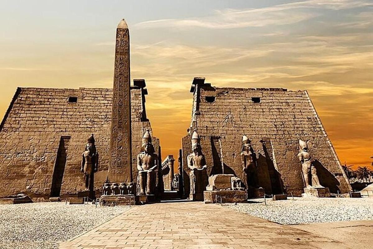 a monument with a obelisk in front