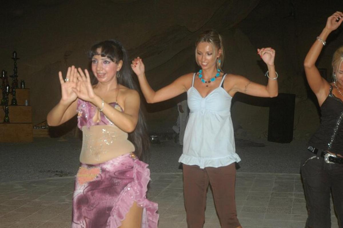 a group of women dancing on a dance floor