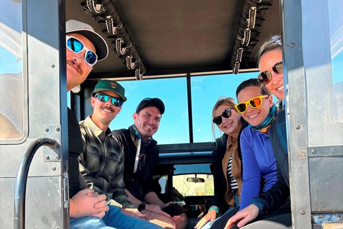 a group of people sitting in a bus