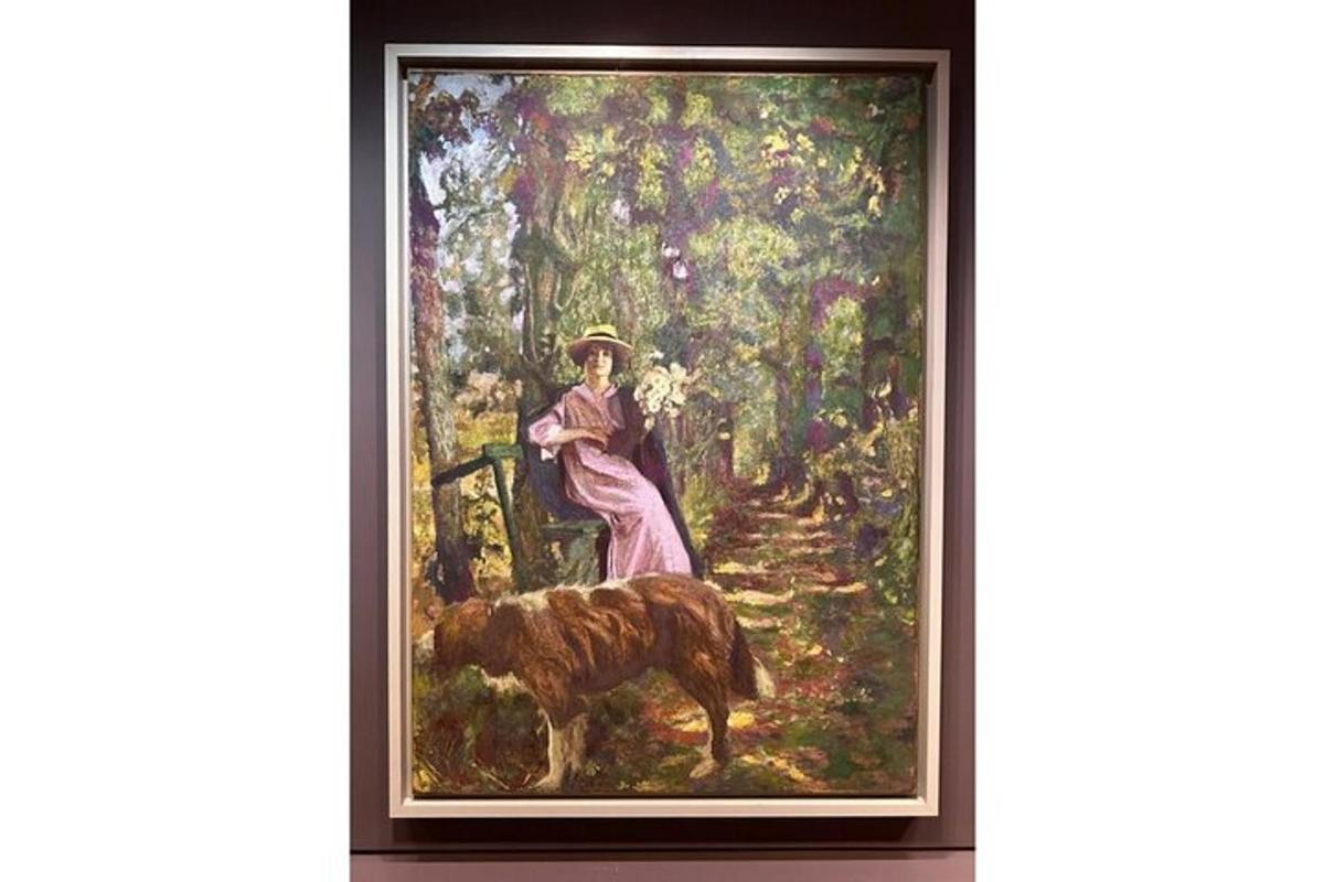 a painting of a woman and a dog in a forest