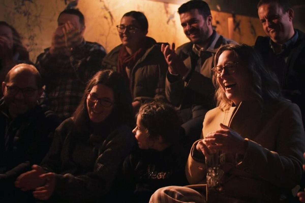 a group of people sitting in a room