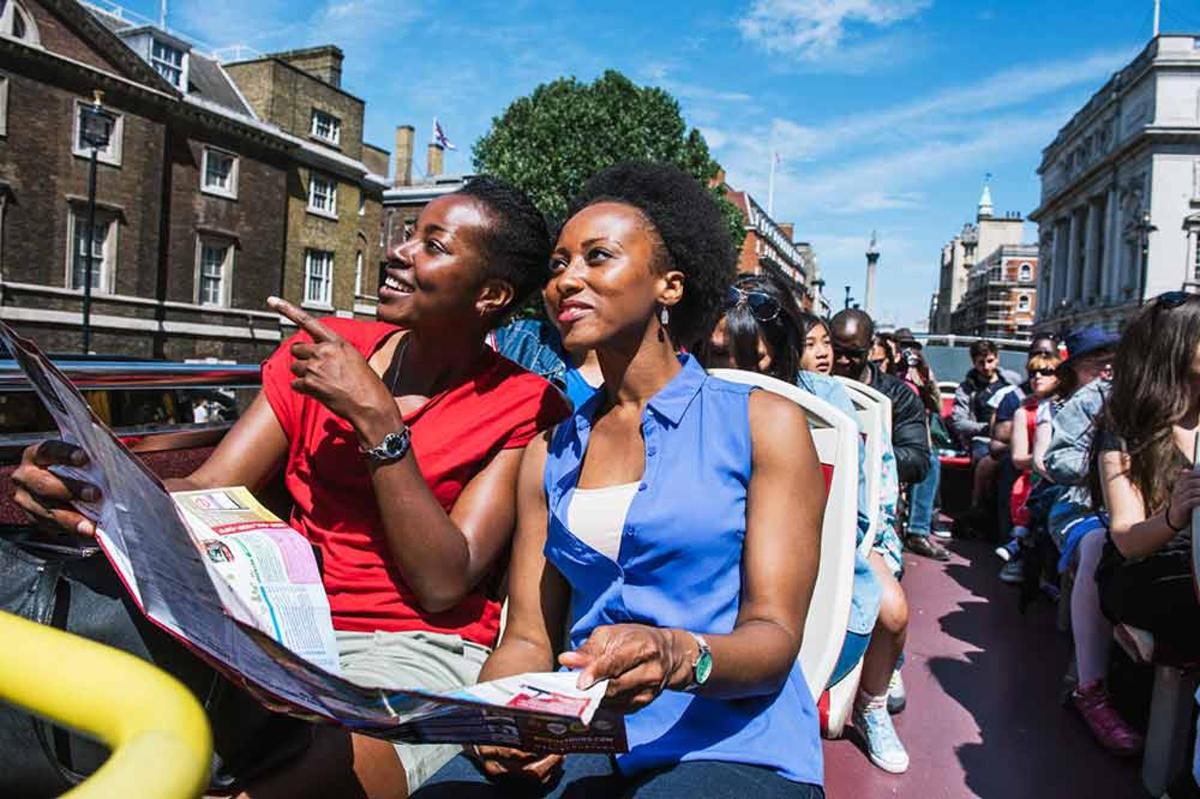 a crowd of people sitting on a bus