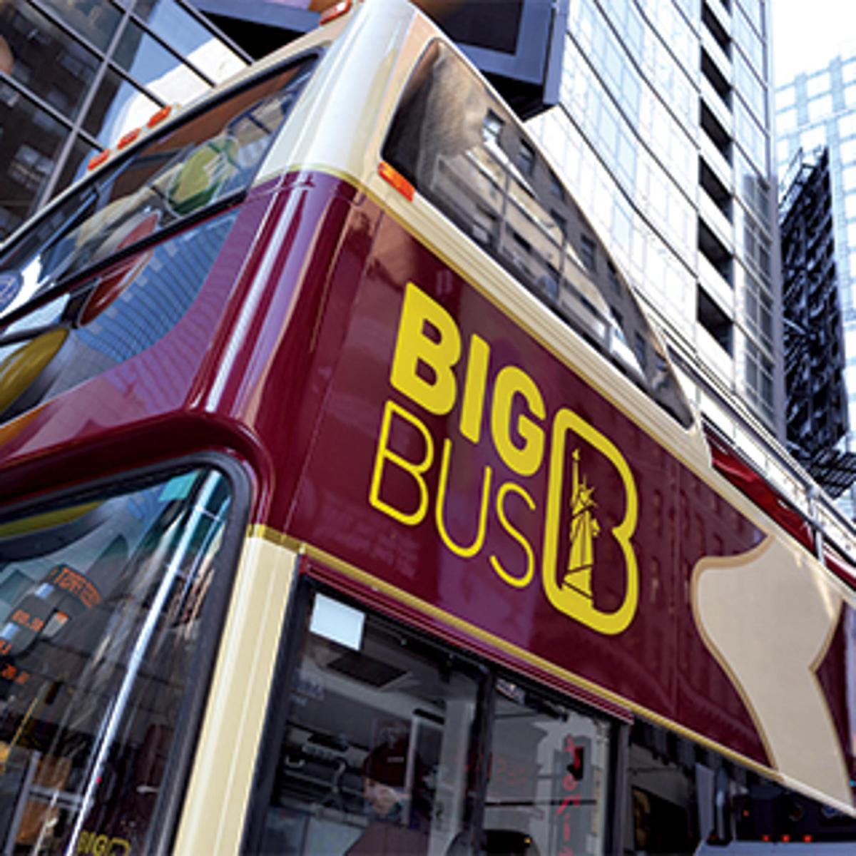 a red double decker bus with the words big bus