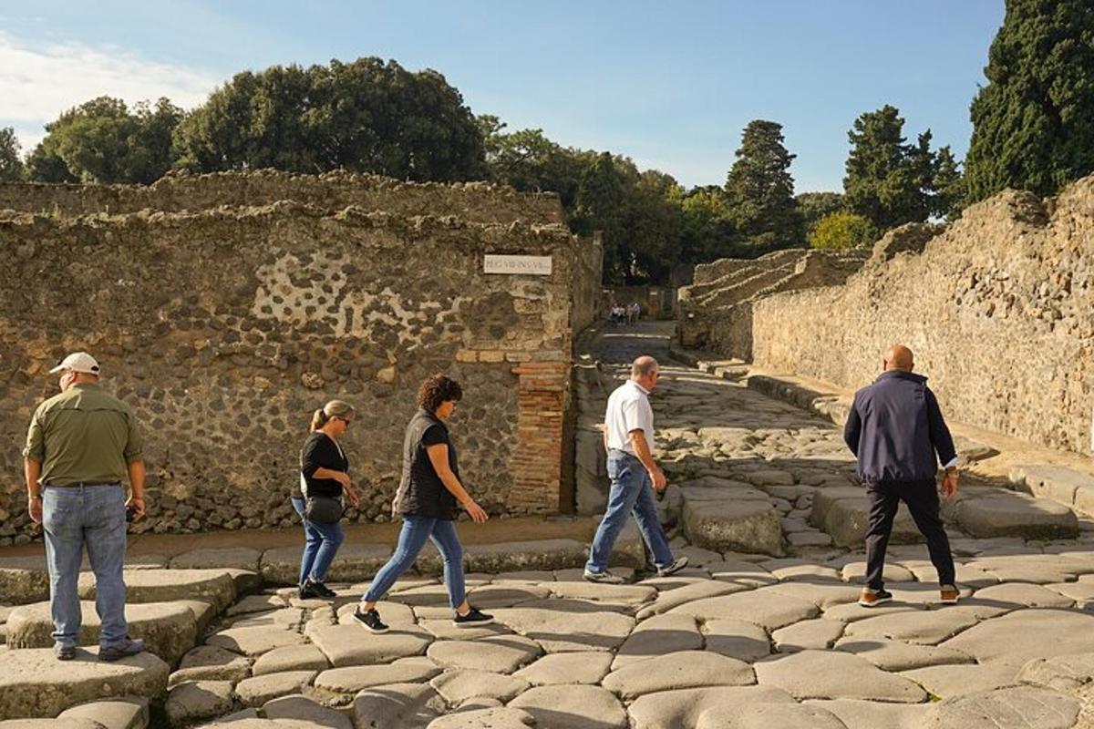 a group of people walking on the rocks