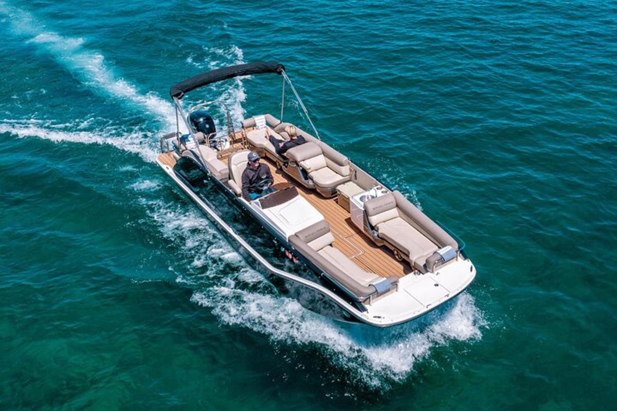 a white boat in the water in the water