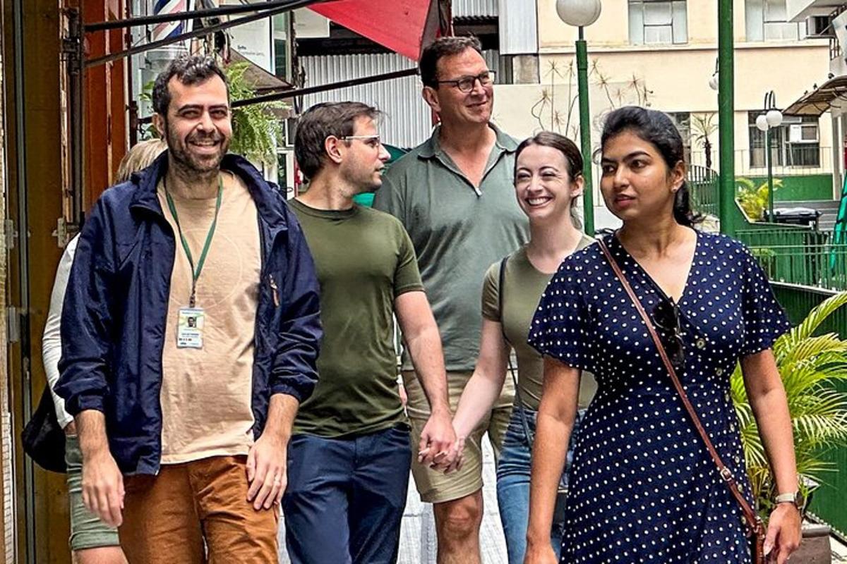a group of people walking down a street