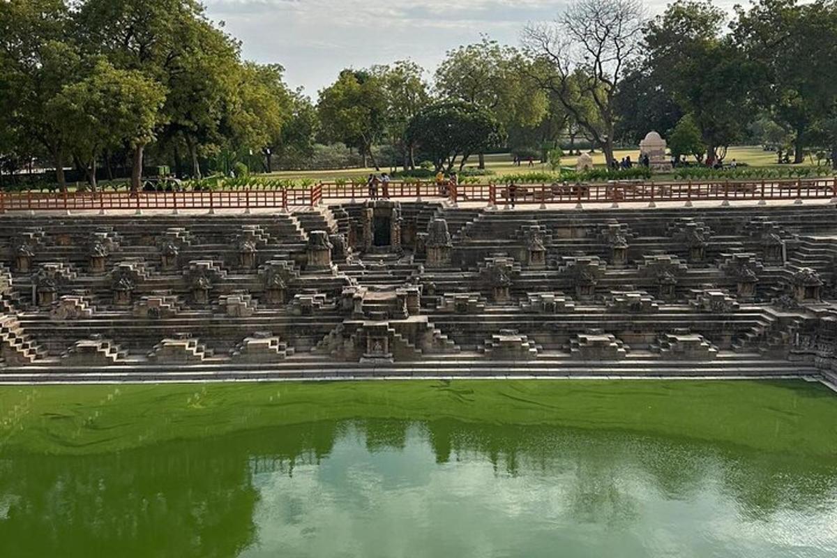 a large amphitheater with a pool of water