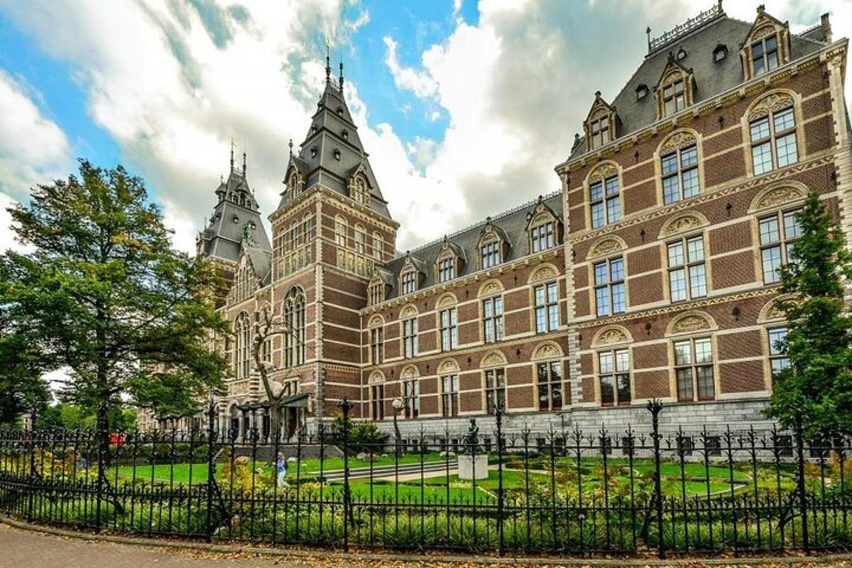 a large building with a fence in front of it