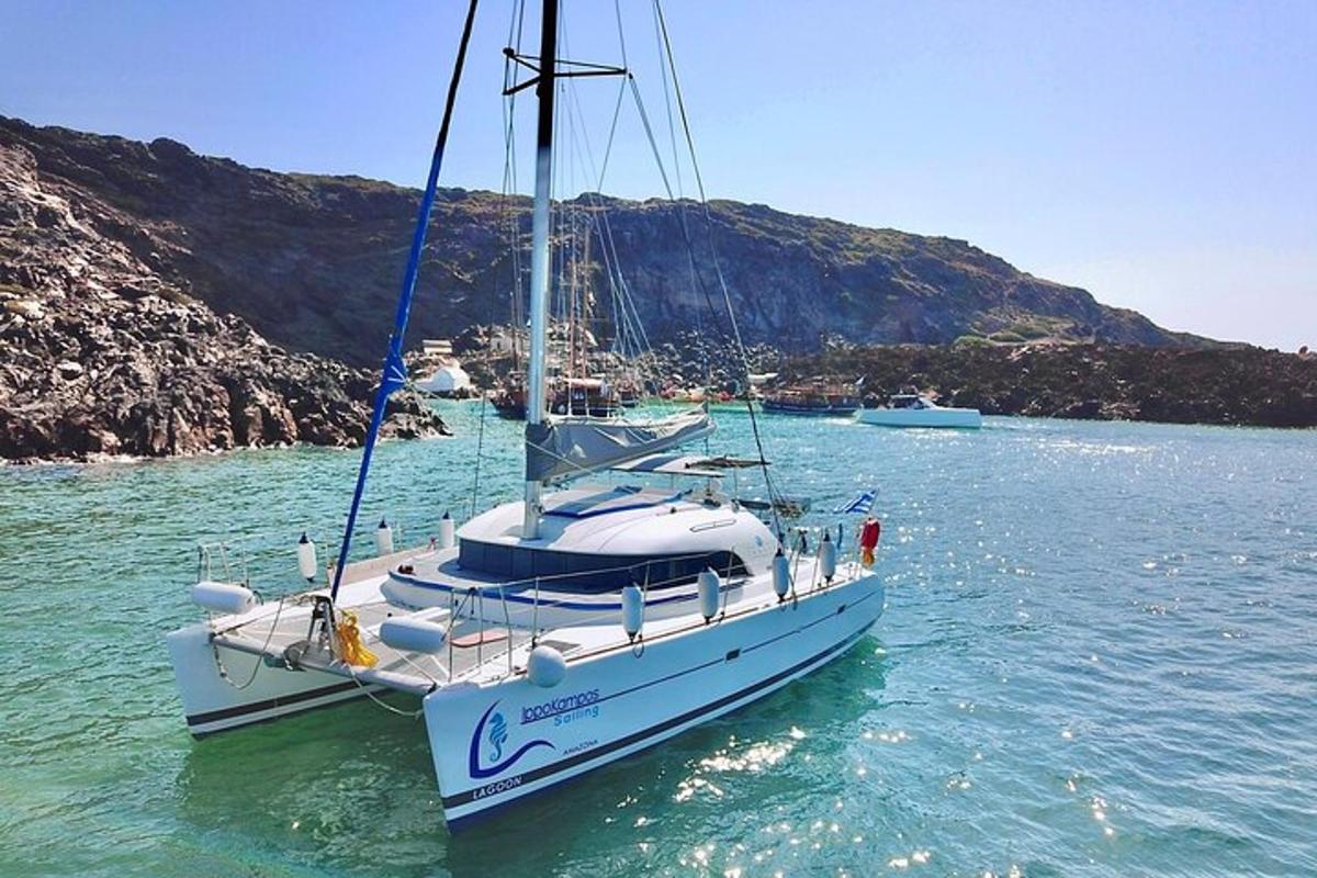 a sailboat is docked in a body of water