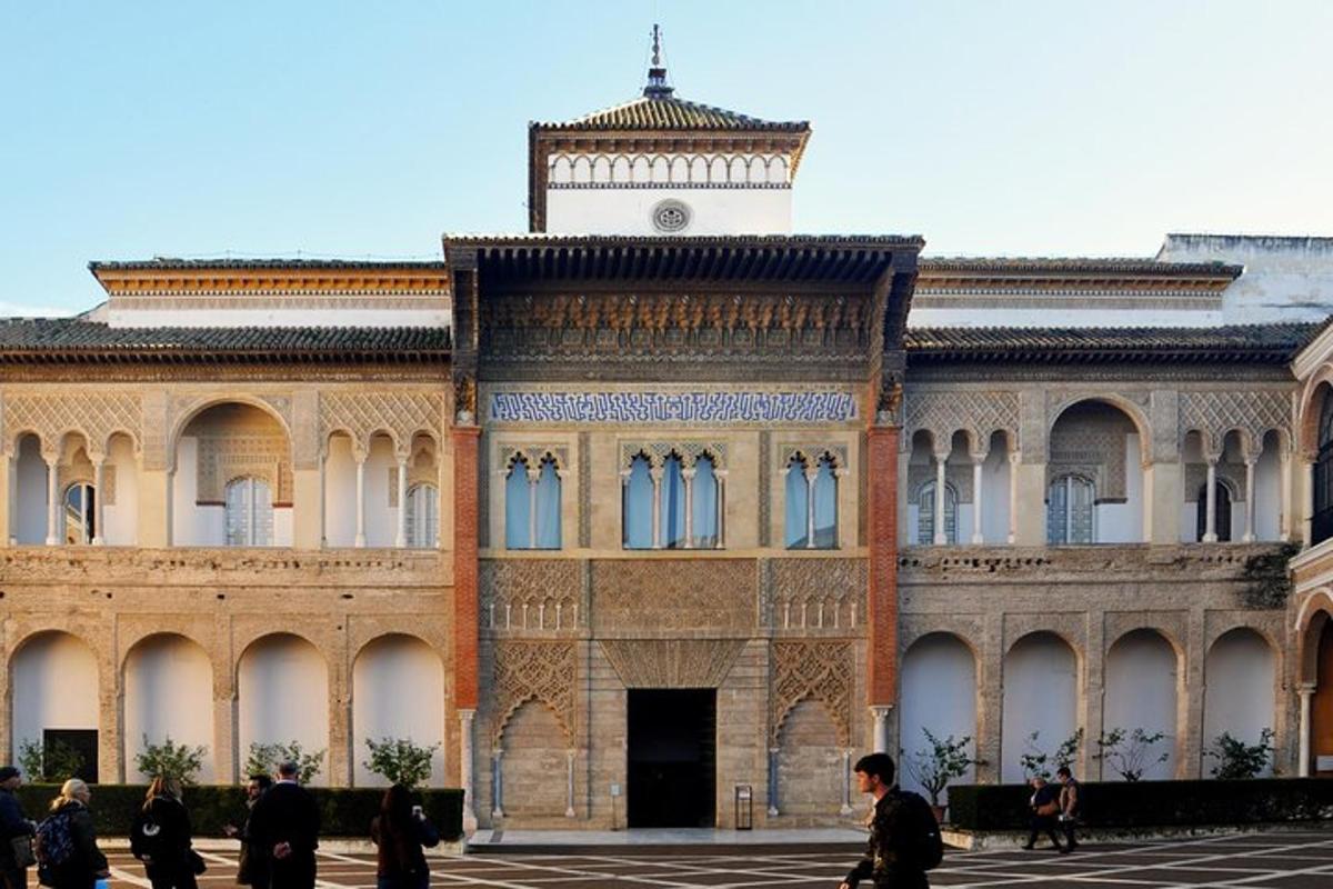 a large building with people walking in front of it