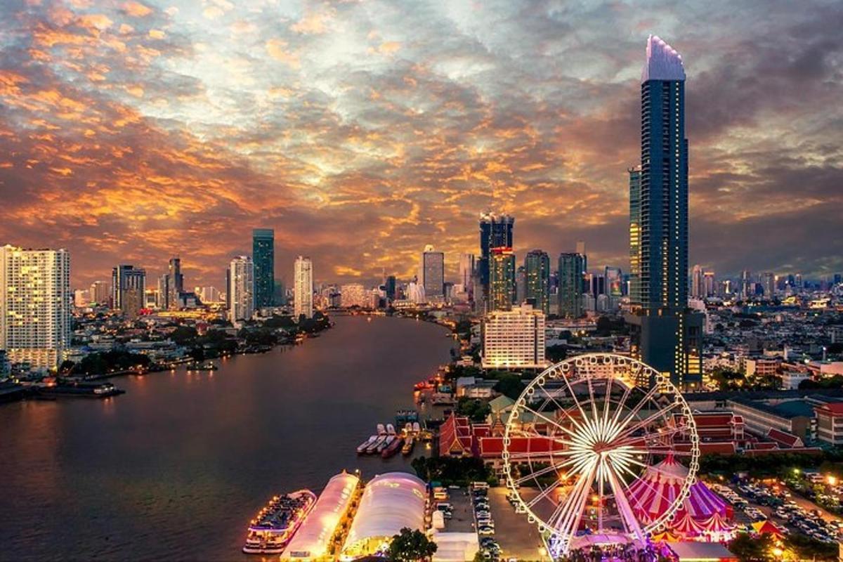eine Skyline mit einem Riesenrad und einer Stadt