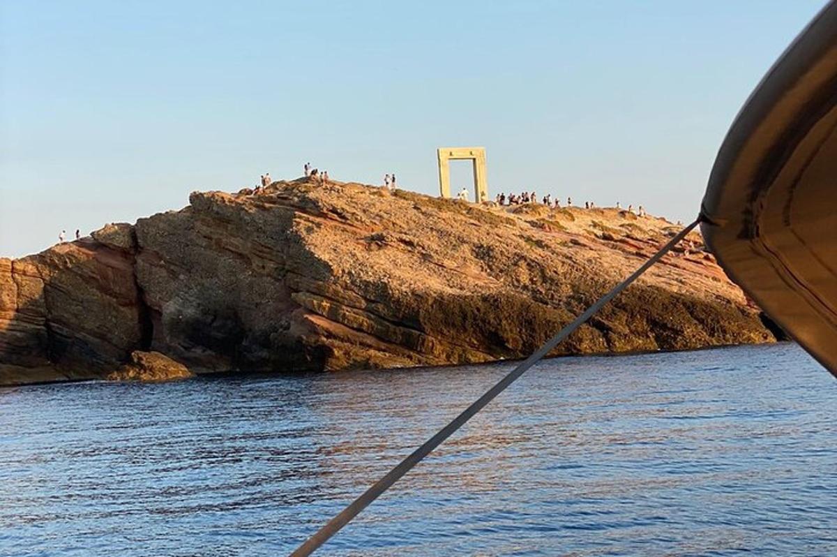 a group of people on a small island in the water