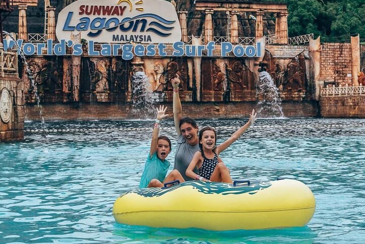 a group of people riding on a raft in the water