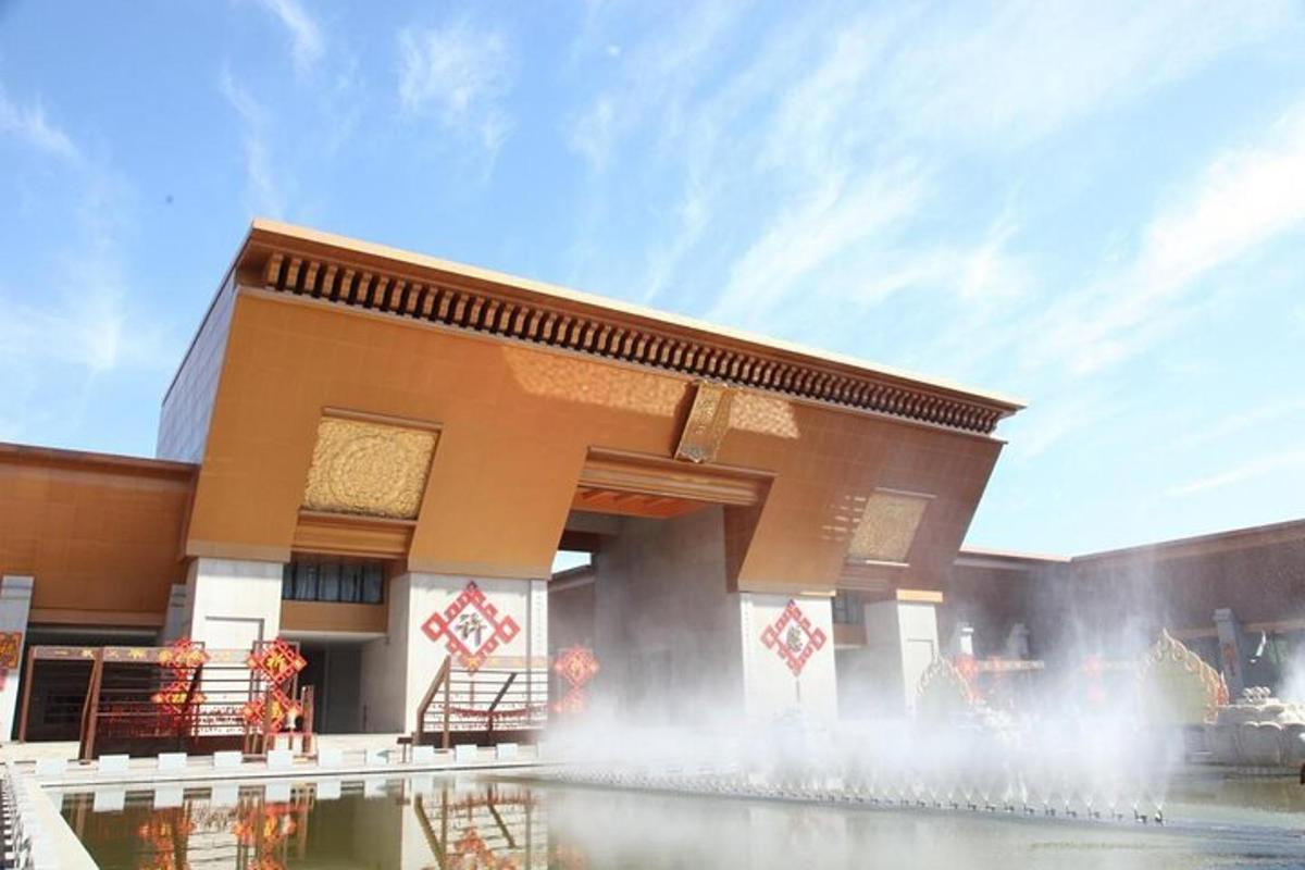 a building with a water fountain in front of it