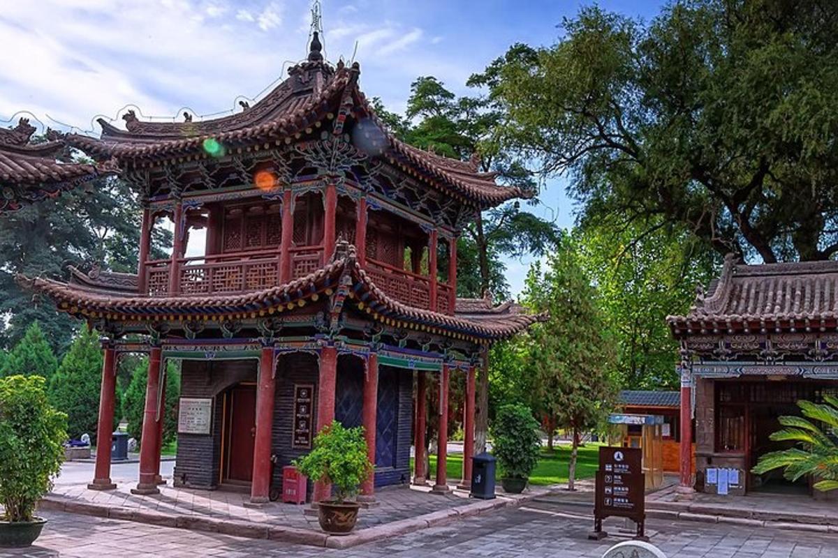 an asian style building in a park