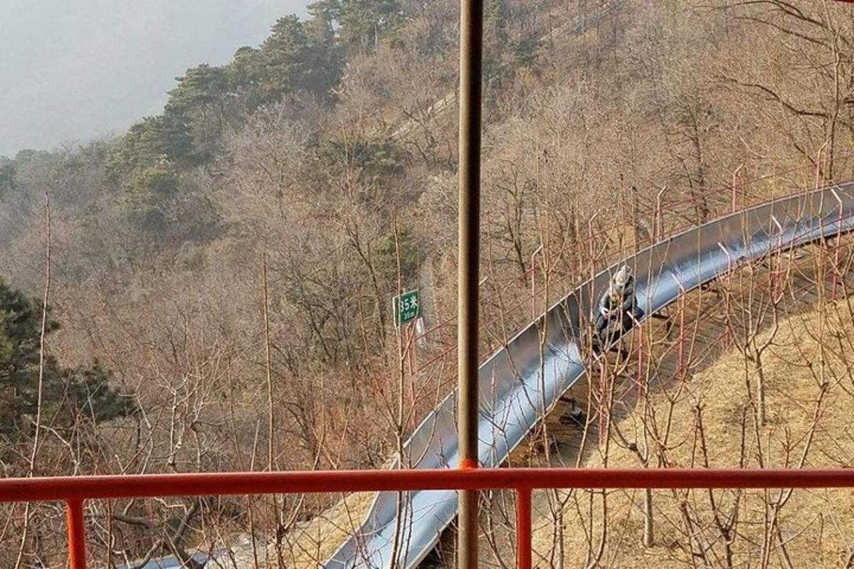 a train is on a track on a bridge