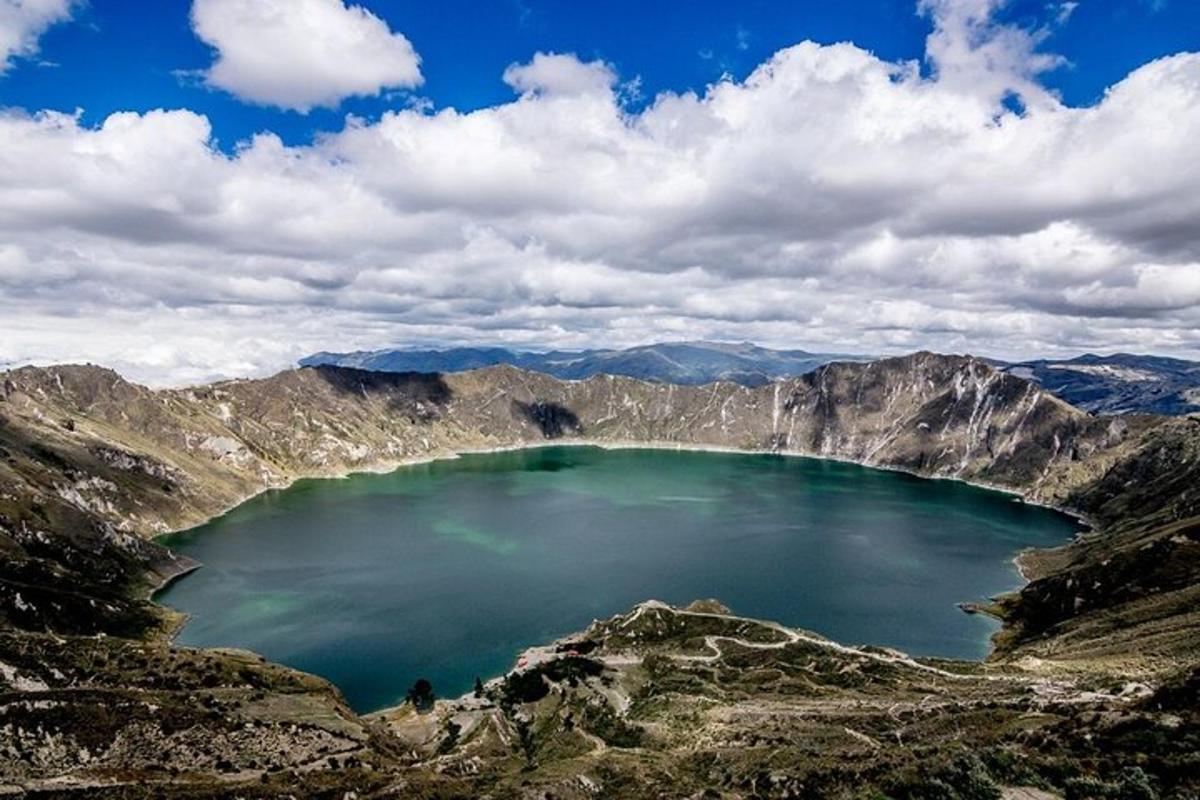 a view of a mountain lake in the mountains