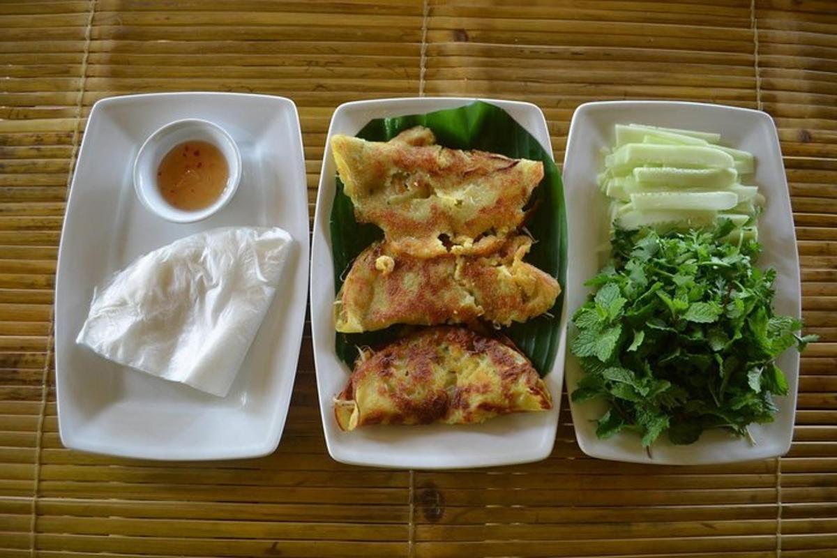 three trays of food sitting on a wooden table