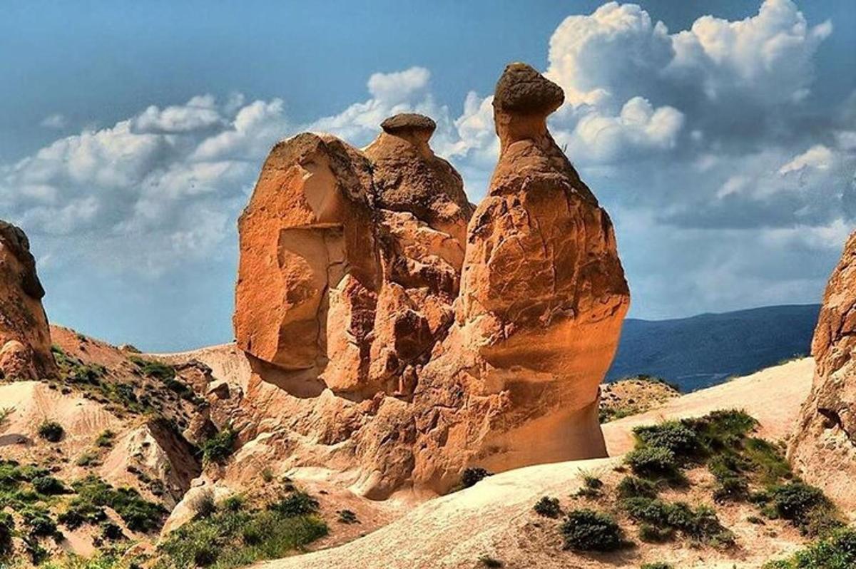 a rock formation in the middle of a desert