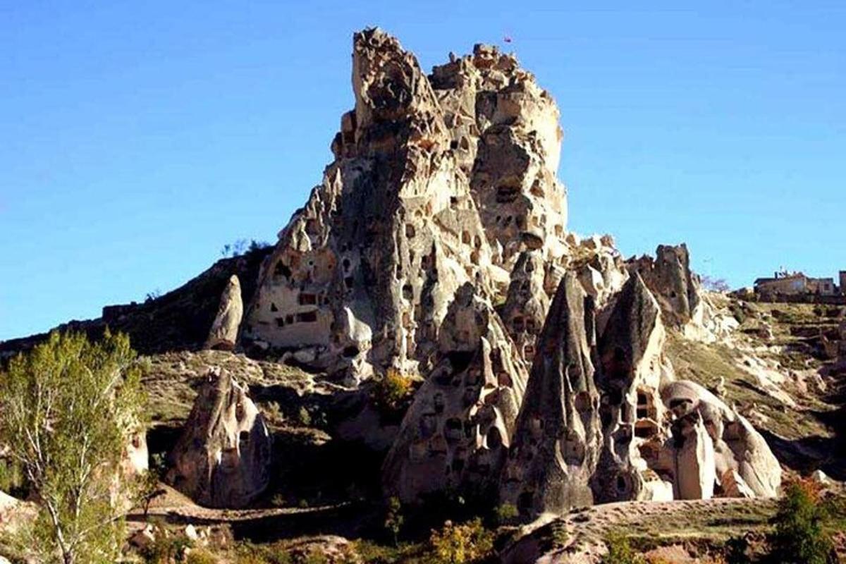a large rock formation on top of a mountain