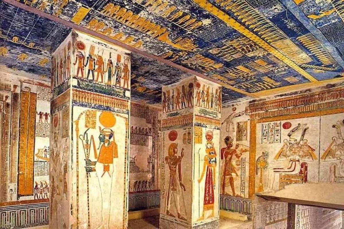 a room with paintings on the walls and ceilings