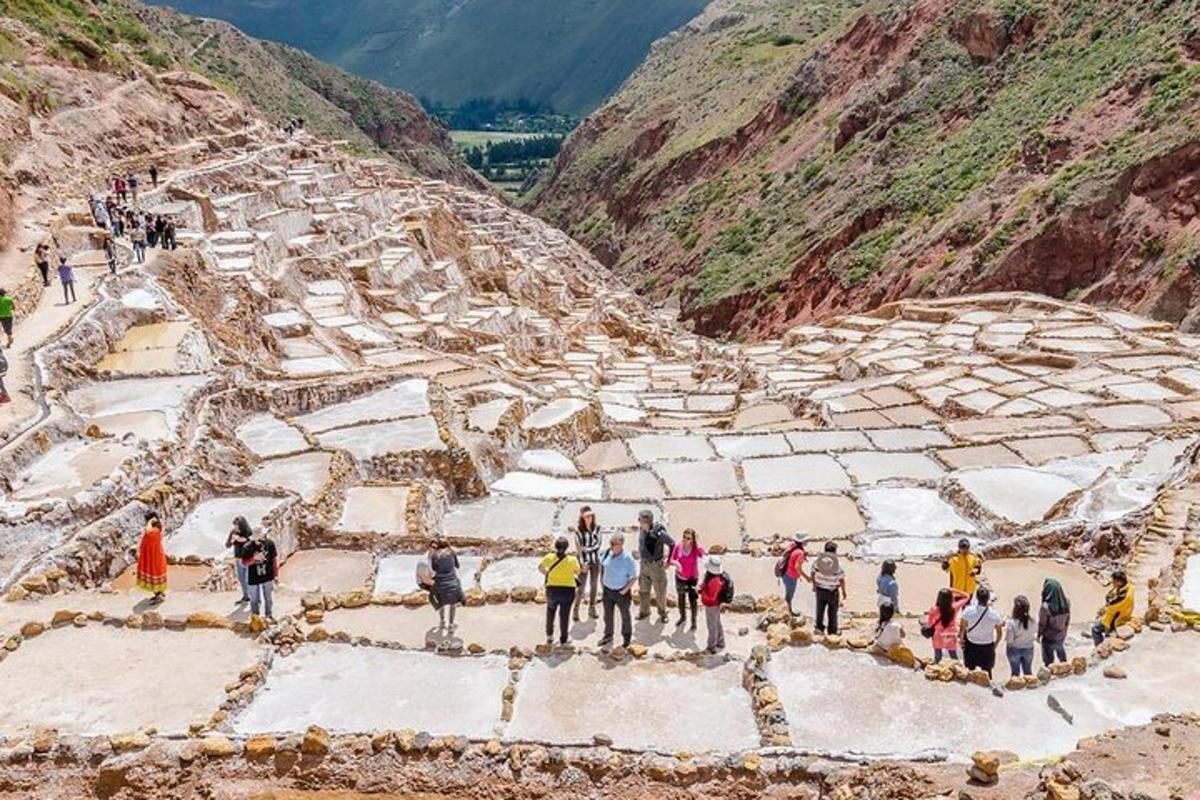a group of people standing on top of a mountain
