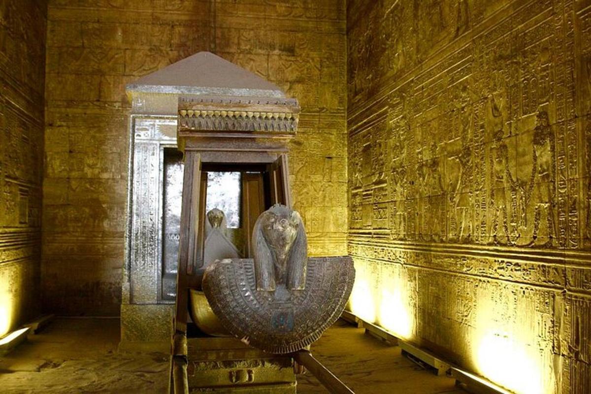 a room with a statue of an elephant on a wall