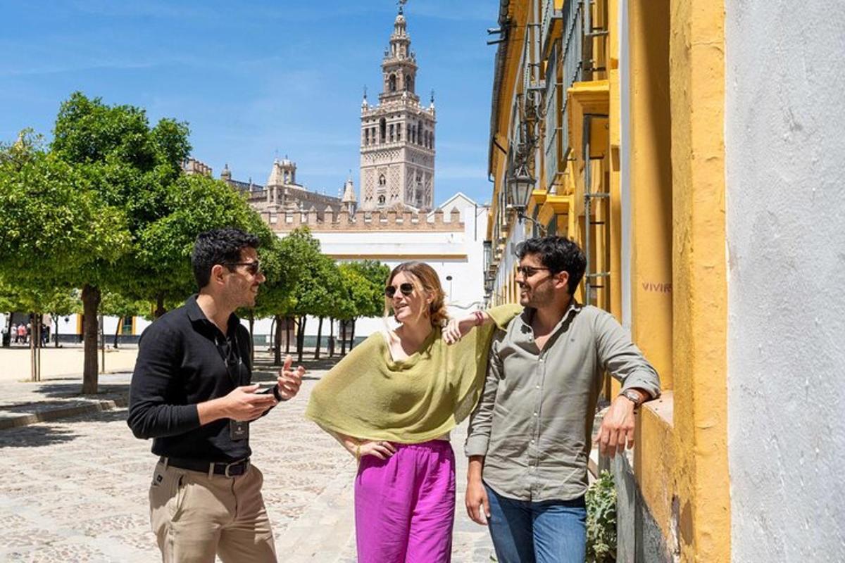 a group of three people standing next to a building