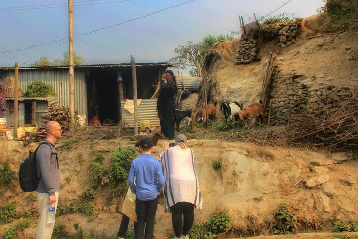 a group of people standing in front of a house