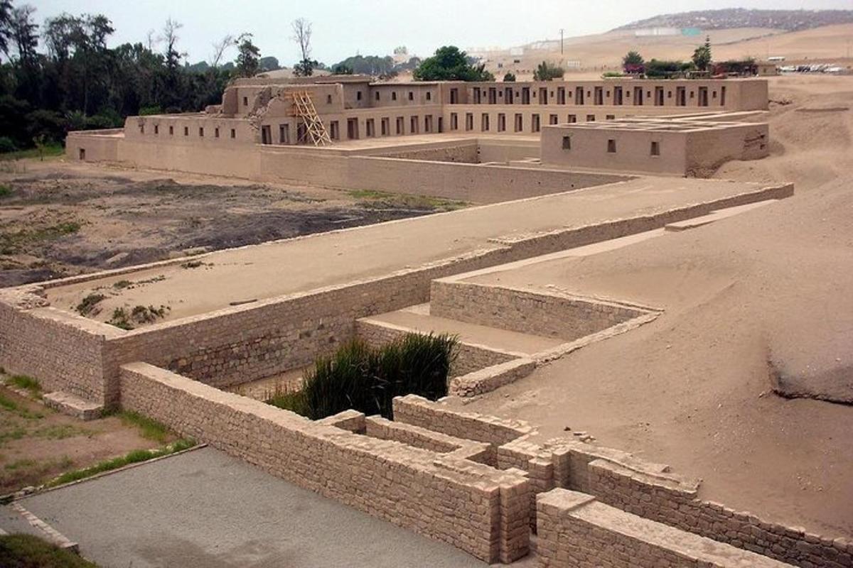 an old building in the middle of a desert