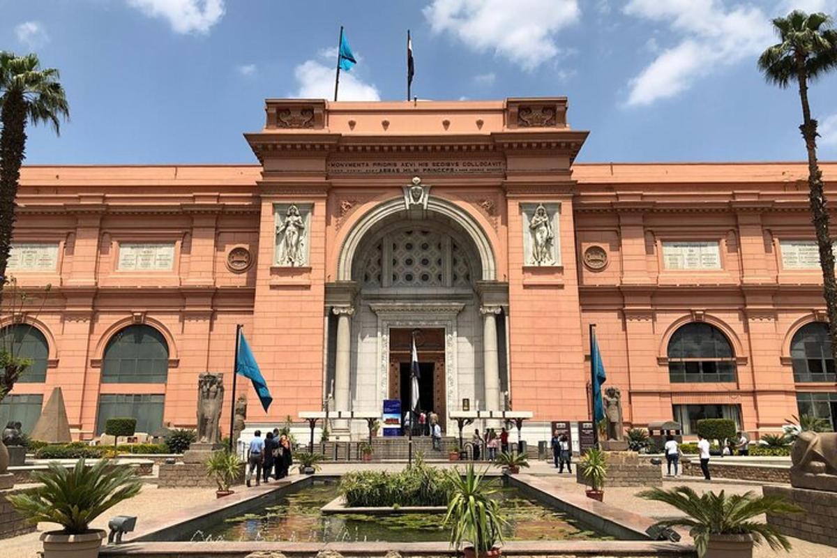 a large brick building with people in front of it