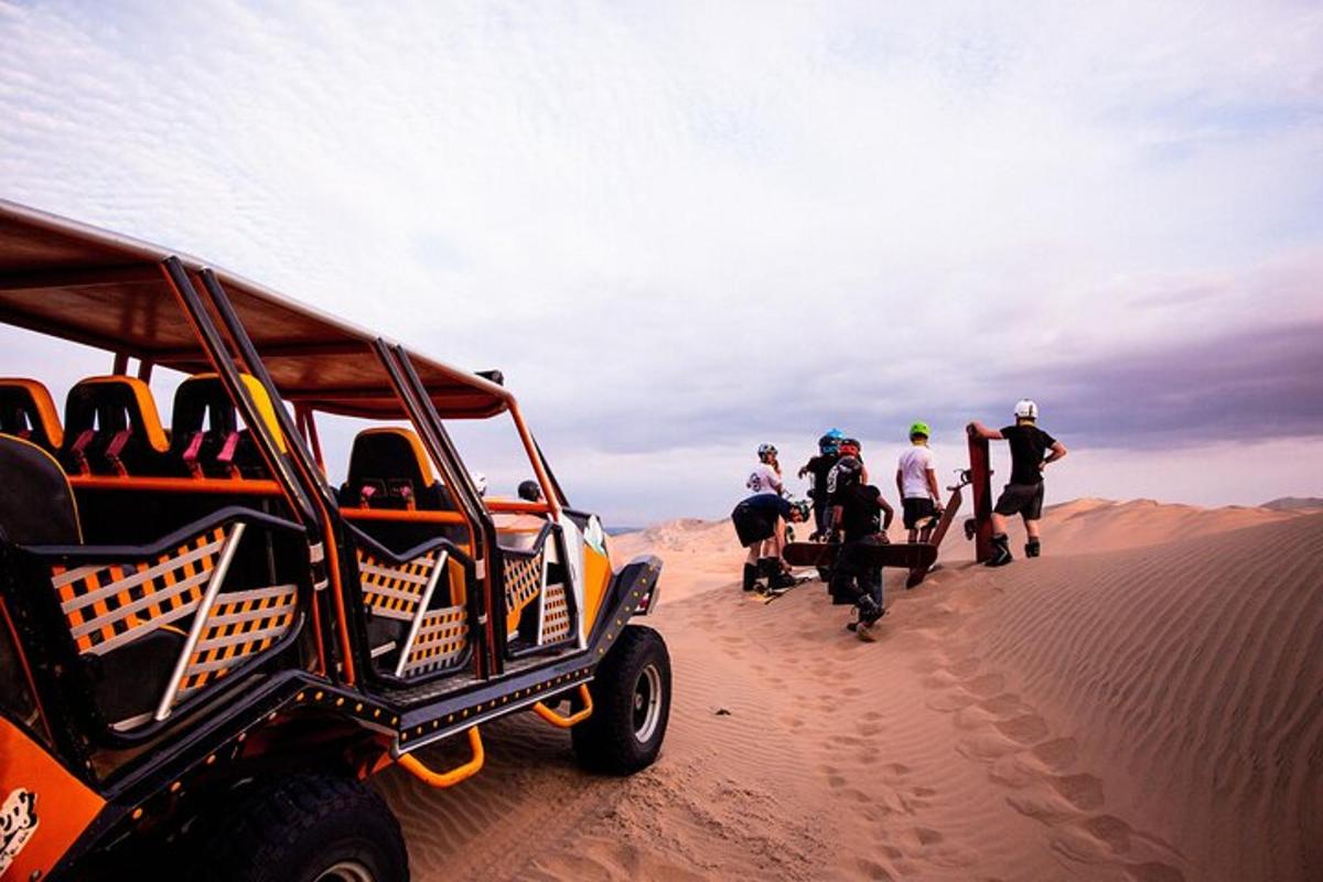 a group of people walking in the desert