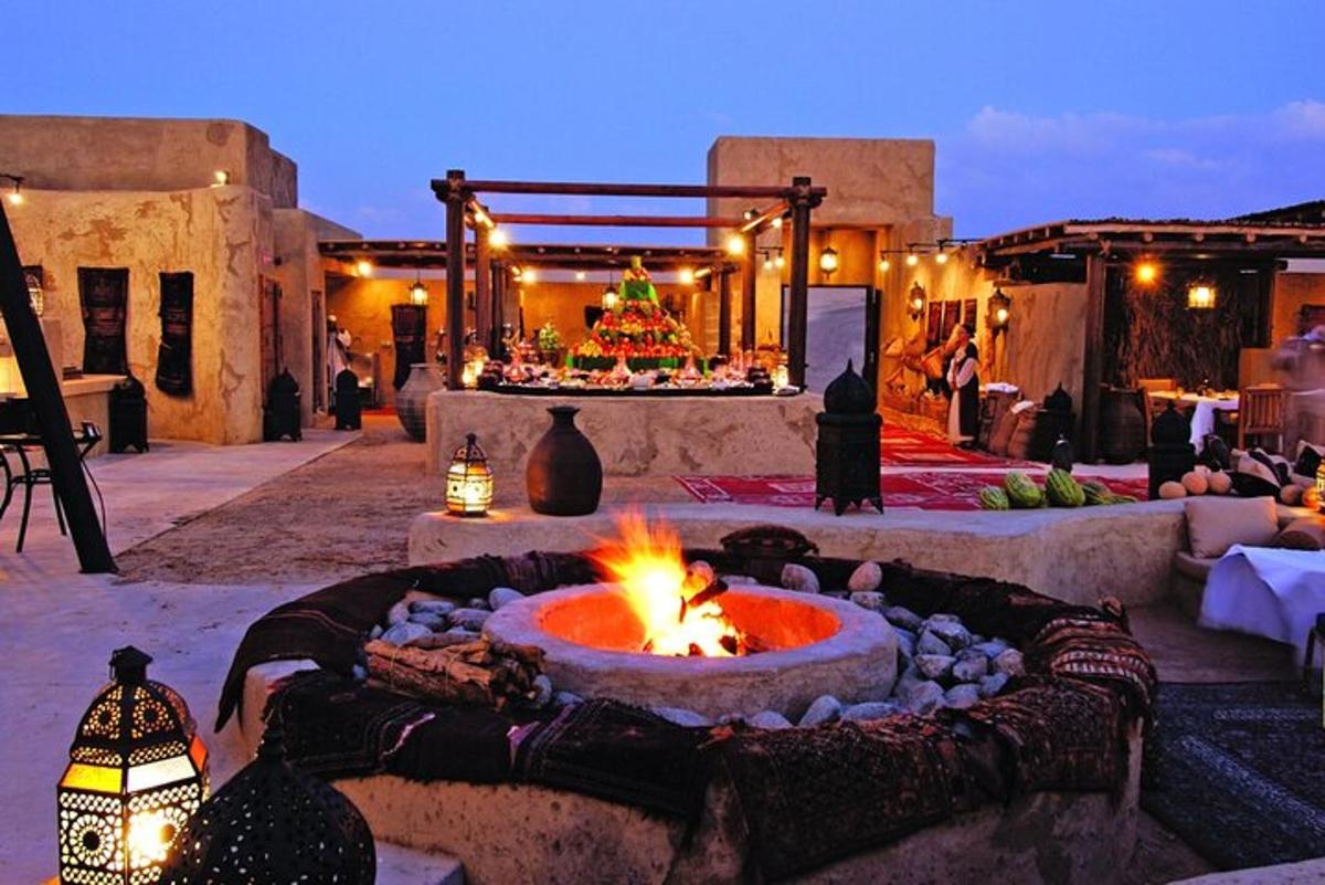 a fire pit in the middle of a patio