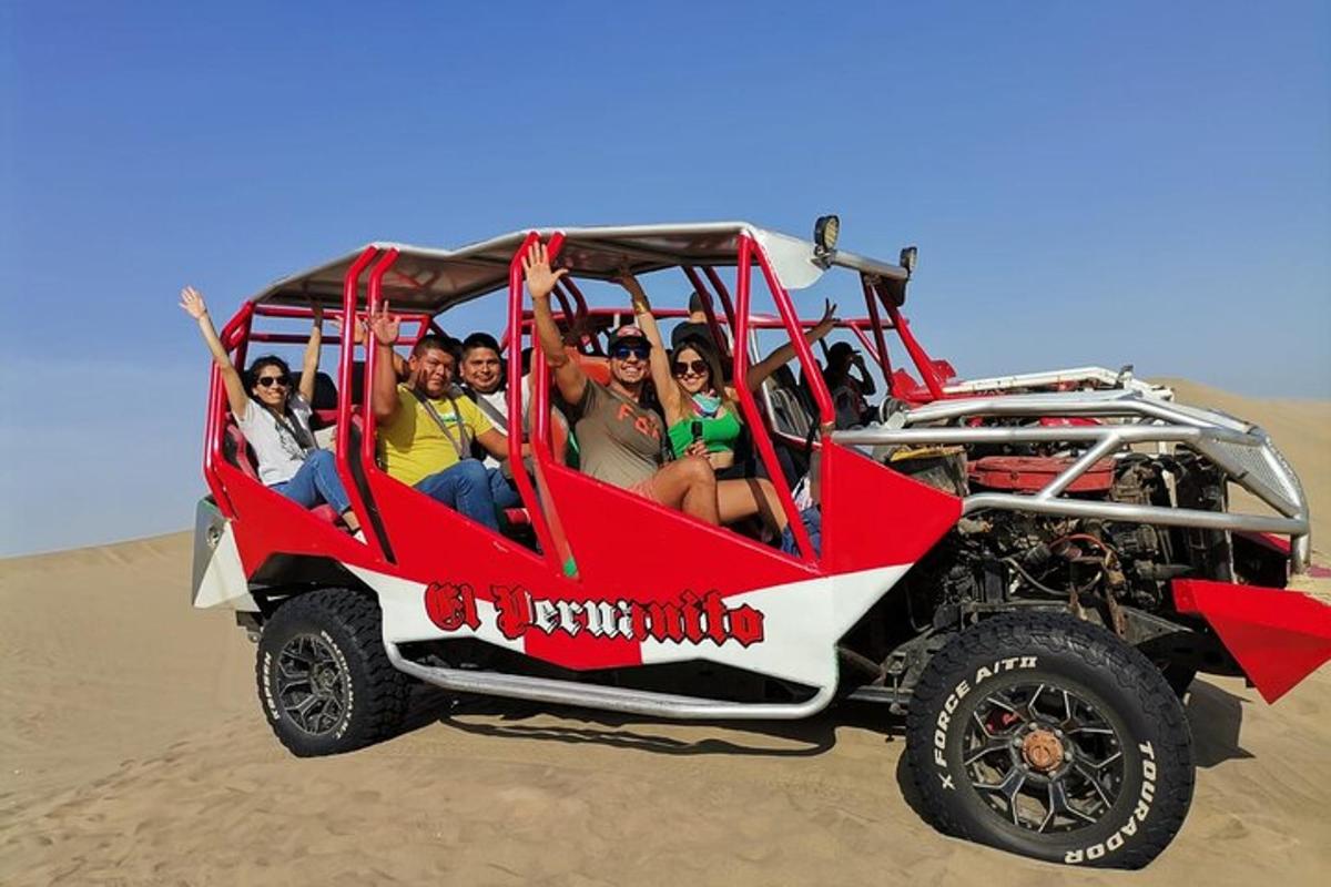 isang grupo ng mga tao na nakasakay sa isang pula at puting jeep sa disyerto