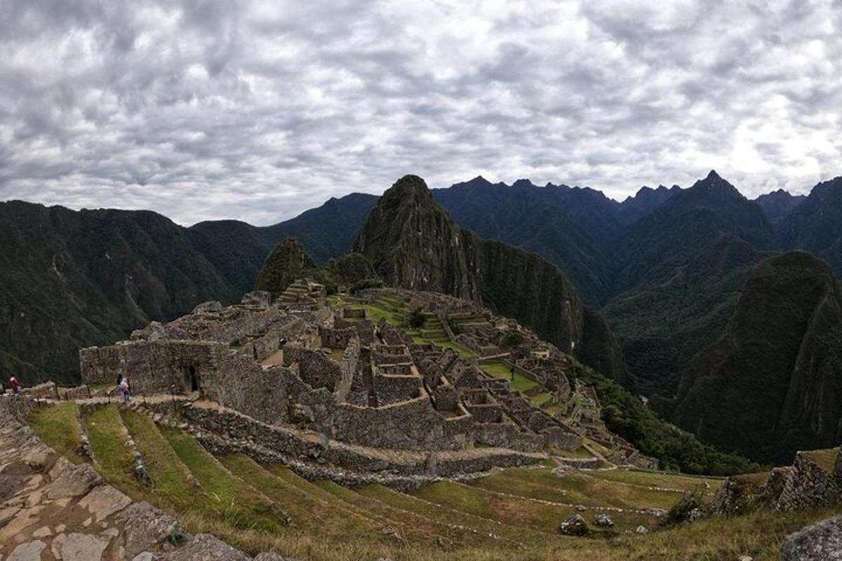 an ancient ruins on the side of a mountain