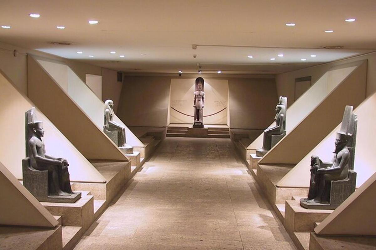 a museum with a statue of a woman on display