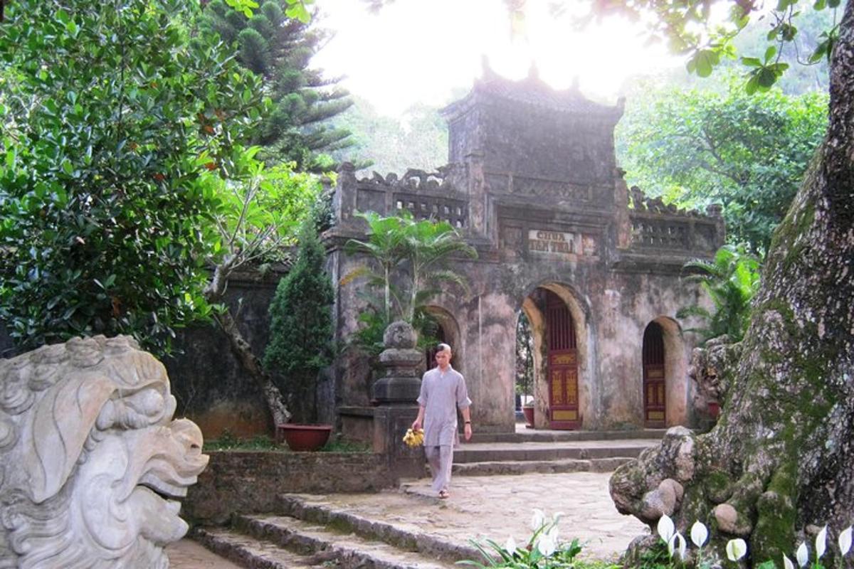 a woman standing in front of a building