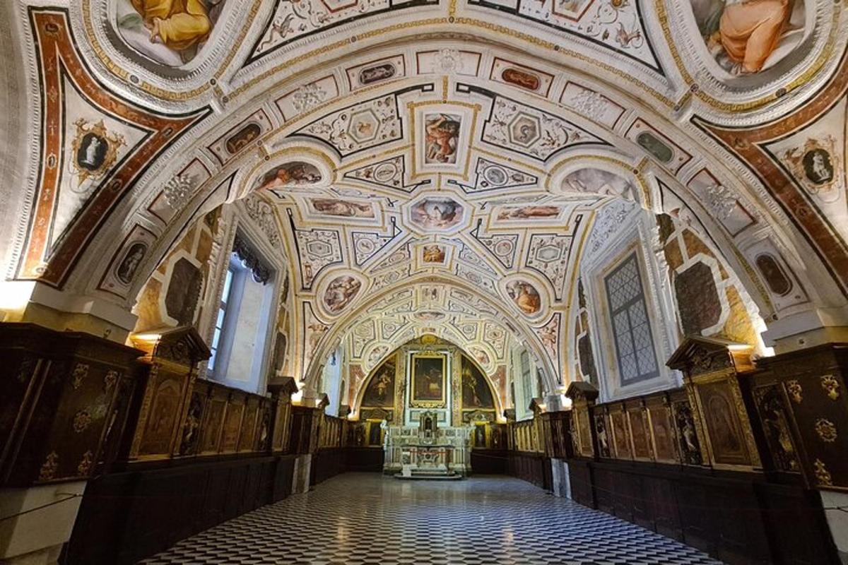 a large room with a ceiling with paintings on it