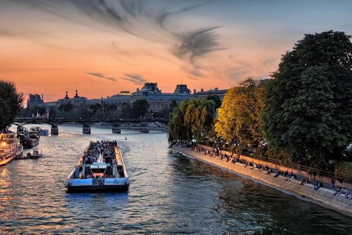 a boat traveling down a river in a city