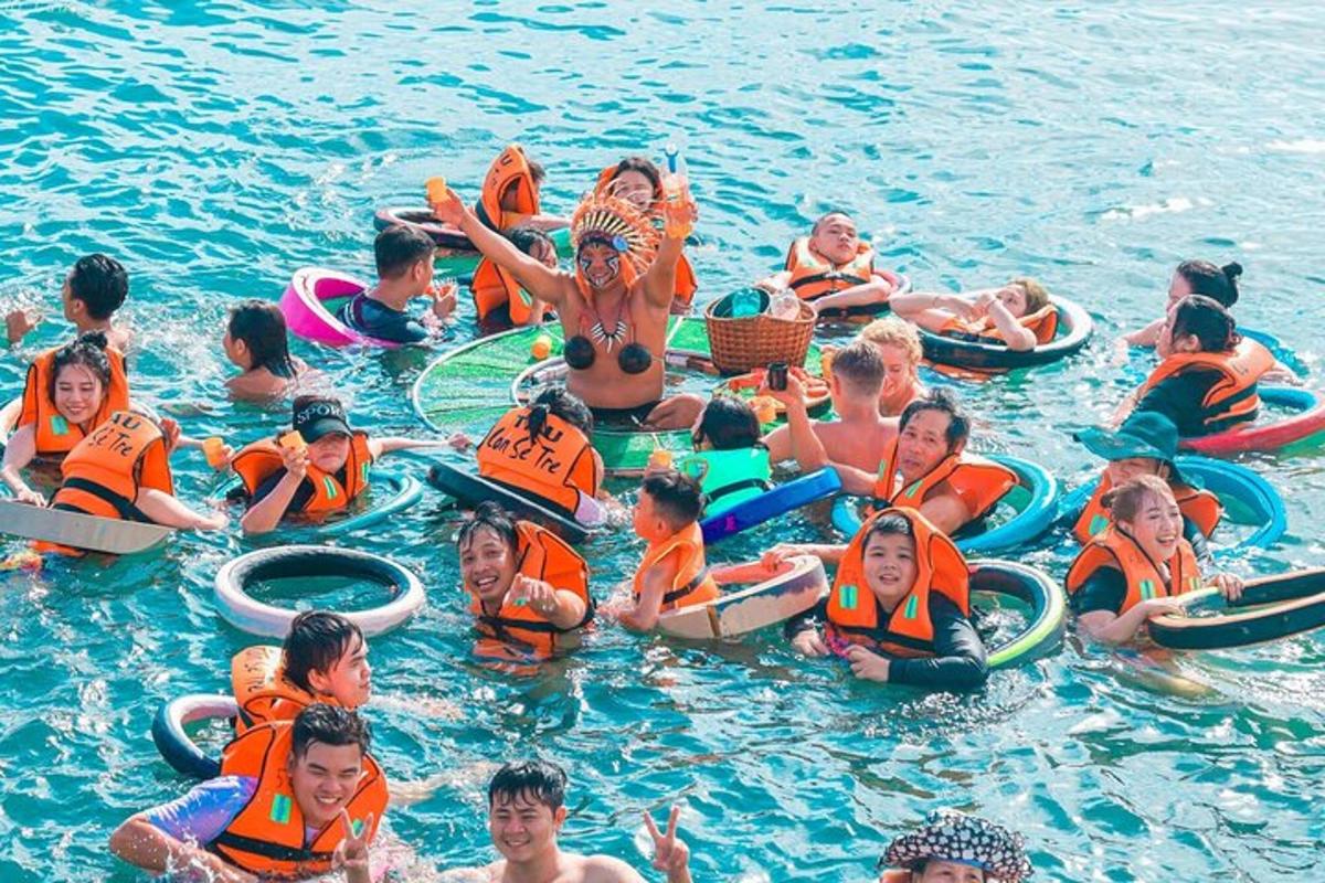 a group of people in the water on tubes