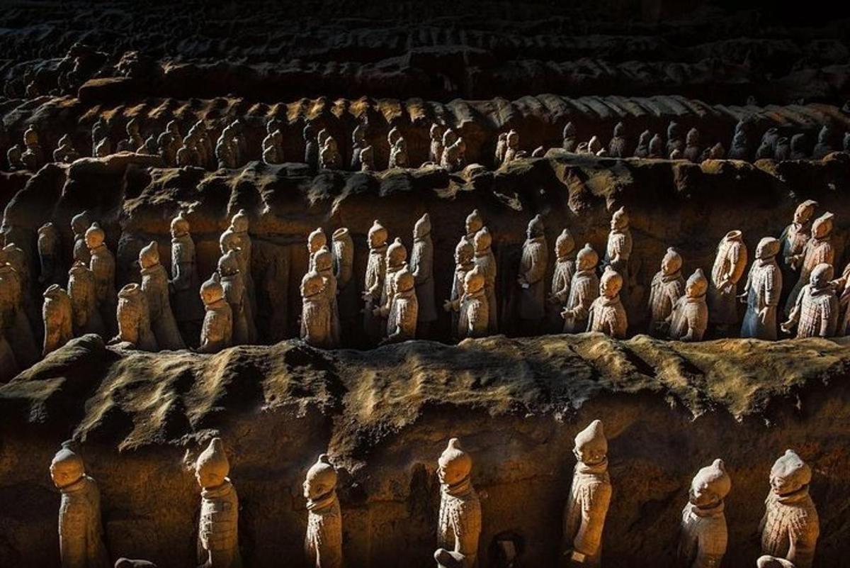 a group of wooden statues on a wall