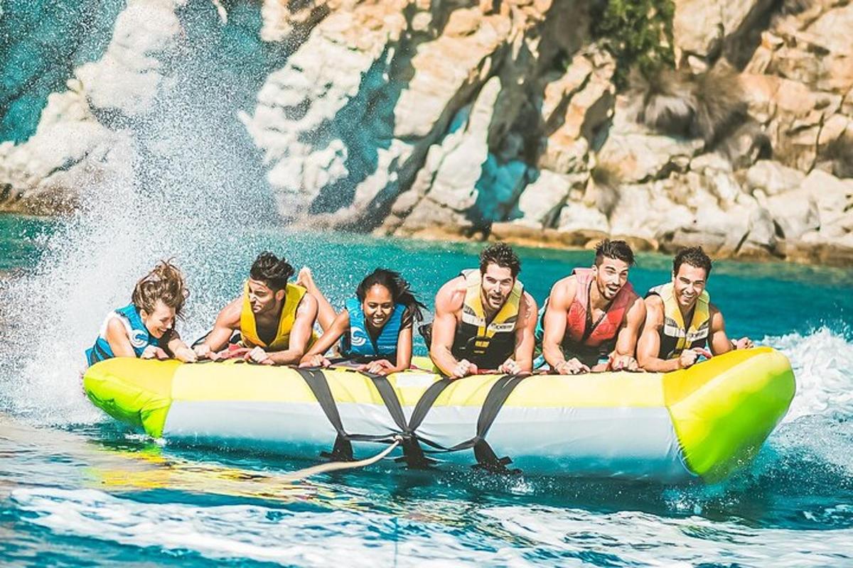 a group of people on a raft in the water