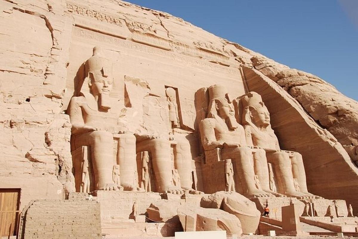 a large building with statues on the side of it